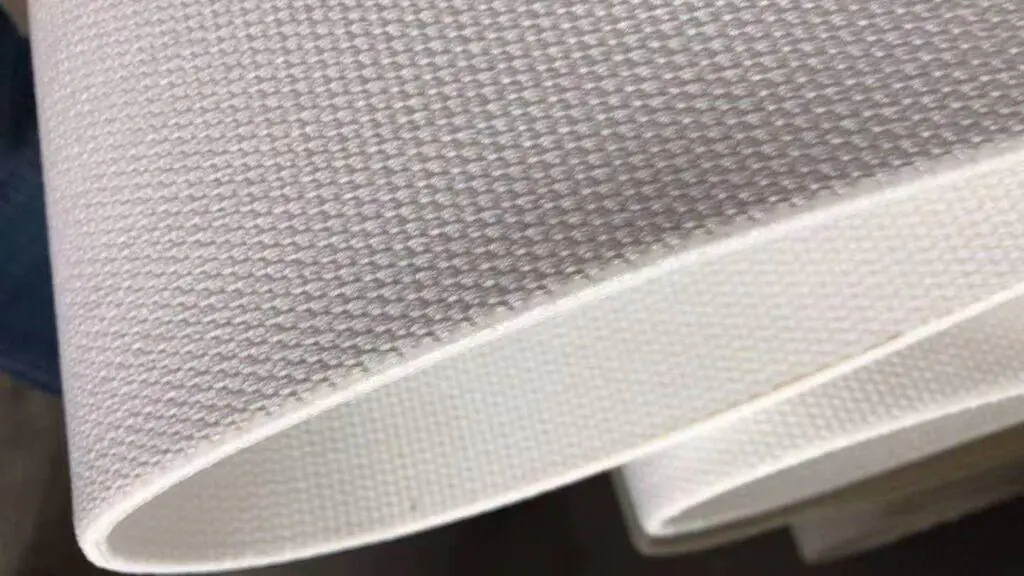 Air slide fabric used in air slide conveyor systems for cement and bulk powder pneumatic conveying.