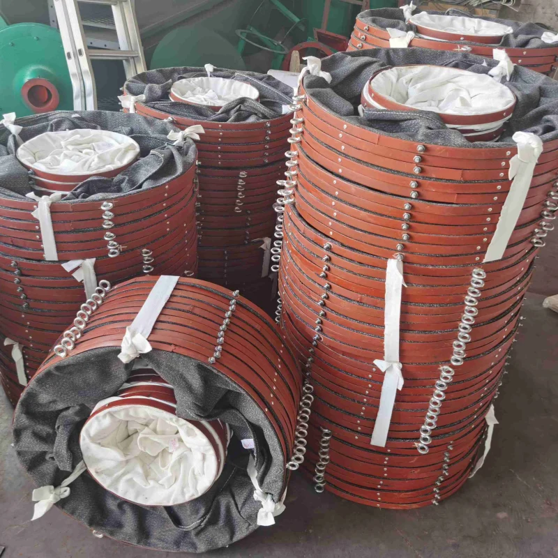 Canvas shrouds stacked, showing flexible dust-proof connectors for industrial conveyors