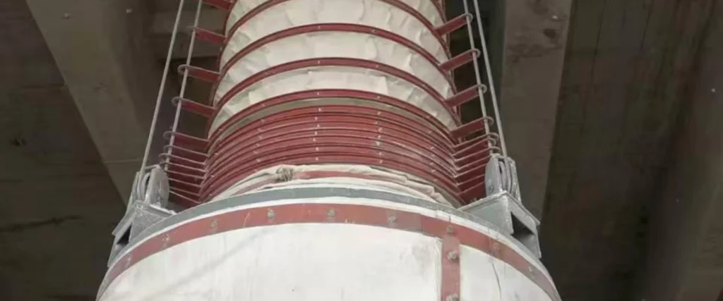 Loading bellows for dust-free bulk material loading into trucks, tankers, and silos