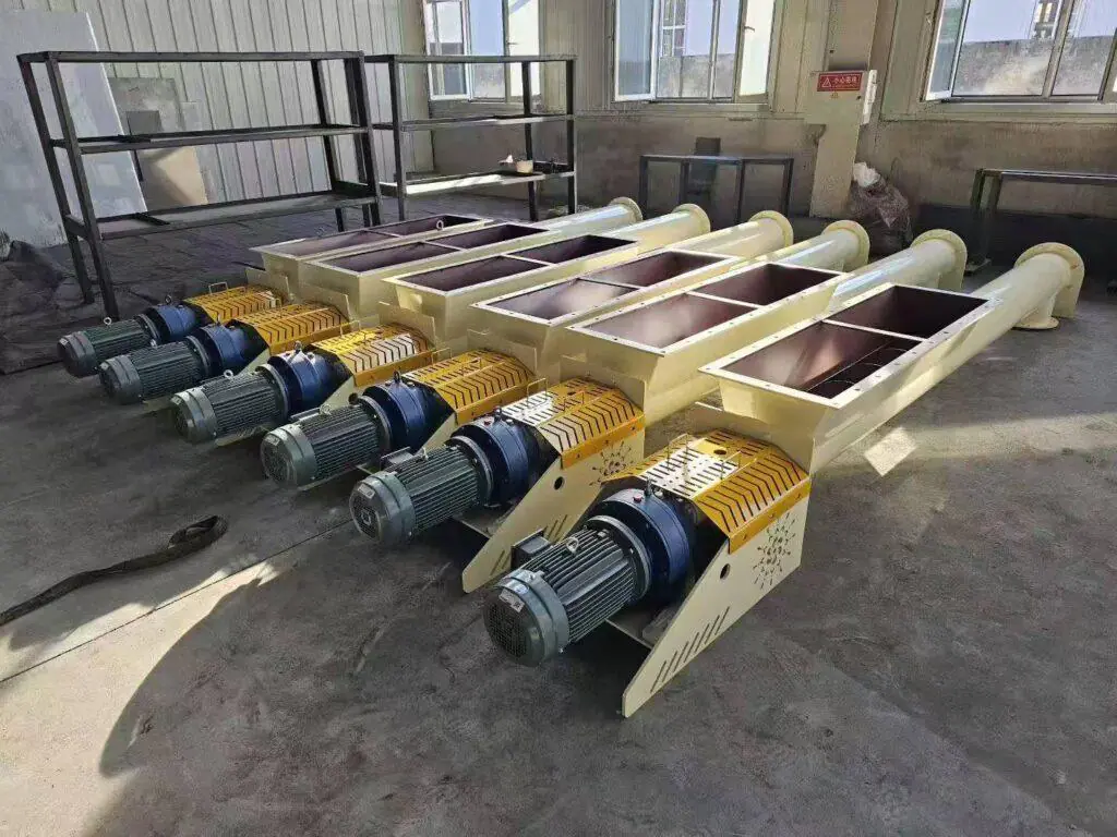 screw conveyor used for controlled feeding of cement and bulk materials in cement plants