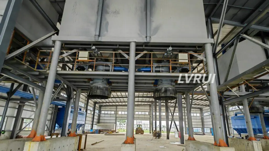 Dust-free loading spout for bulk material loading with telescopic design and dust control system