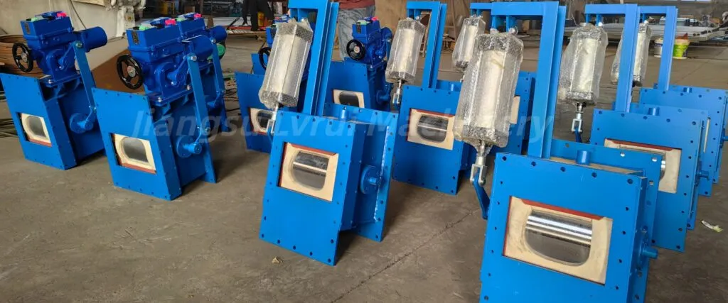 Pneumatic flow control gate for powder and bulk material discharge in cement plants