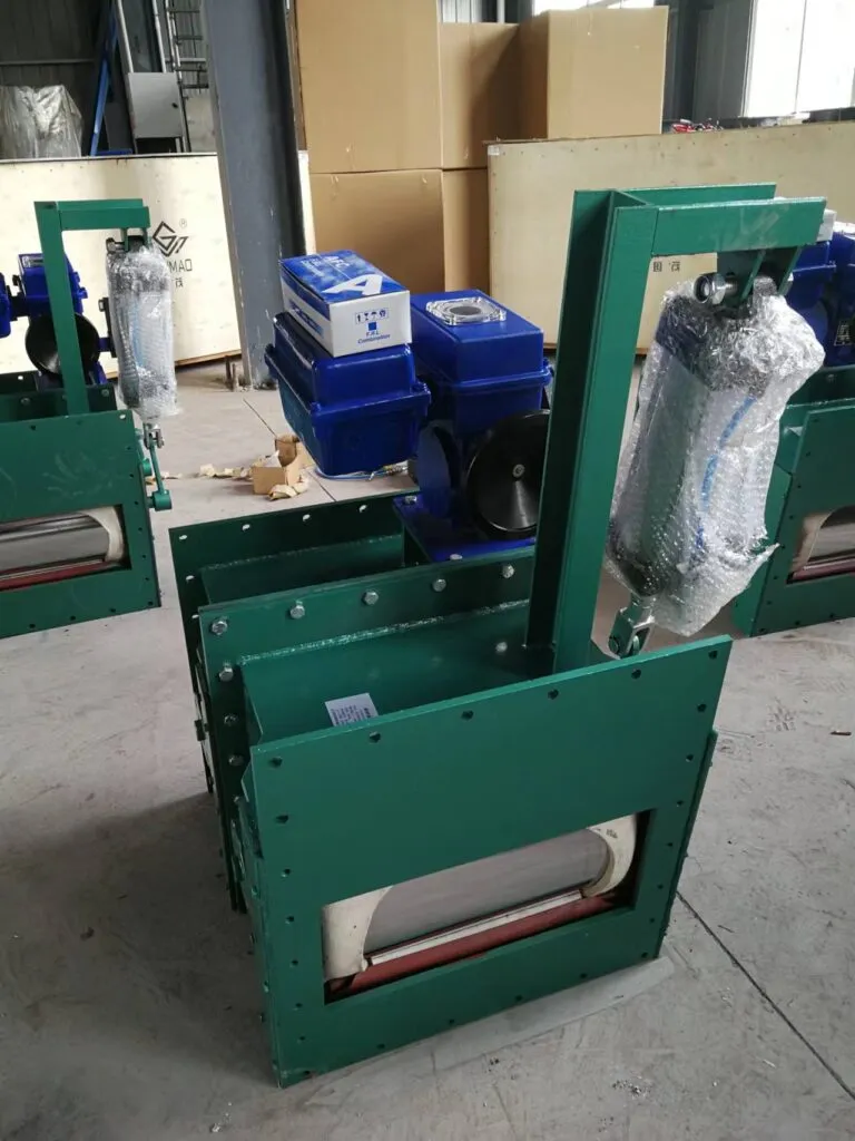 Pneumatic flow control gate for cement silo discharge