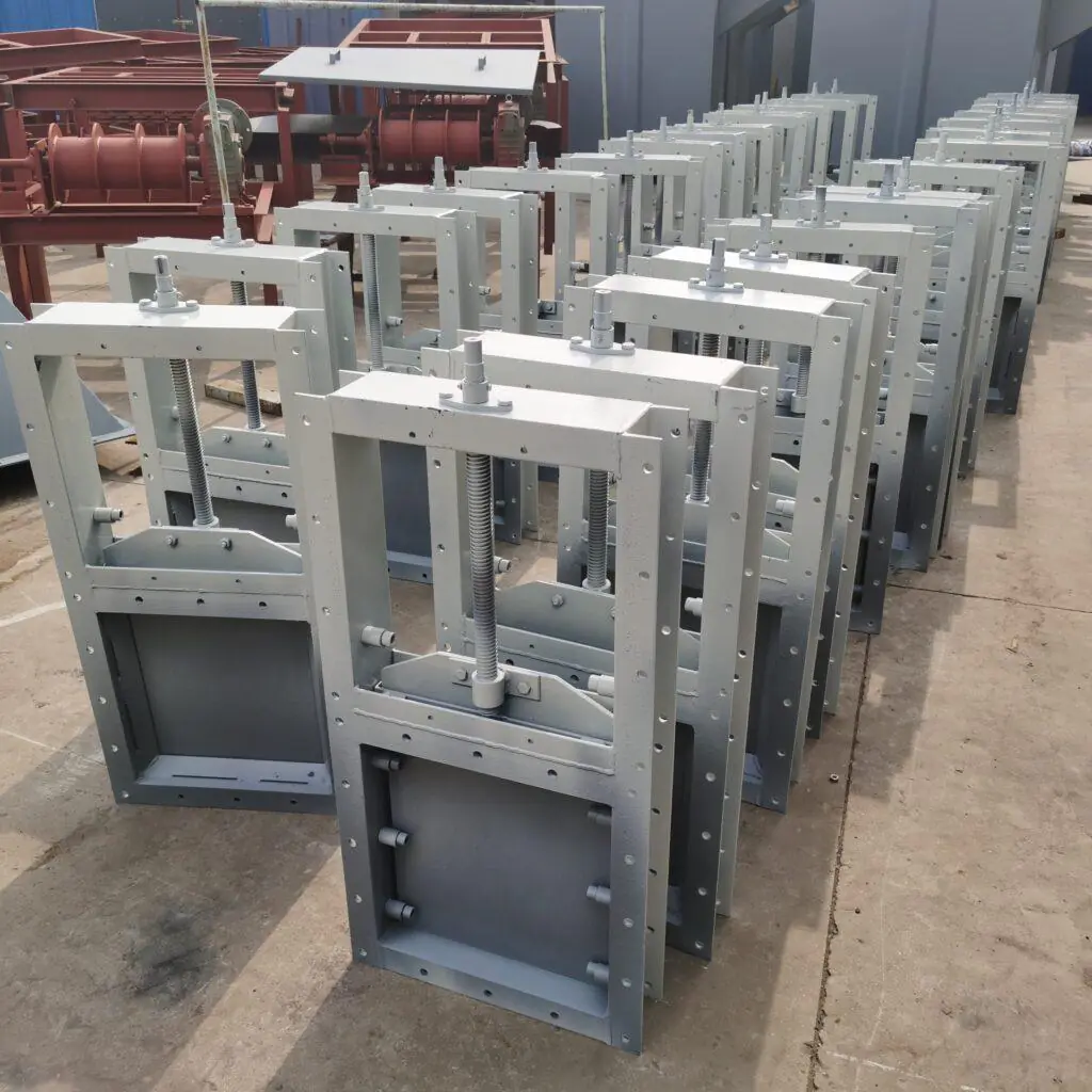 Slide gate valve for cement silo bulk material flow control system