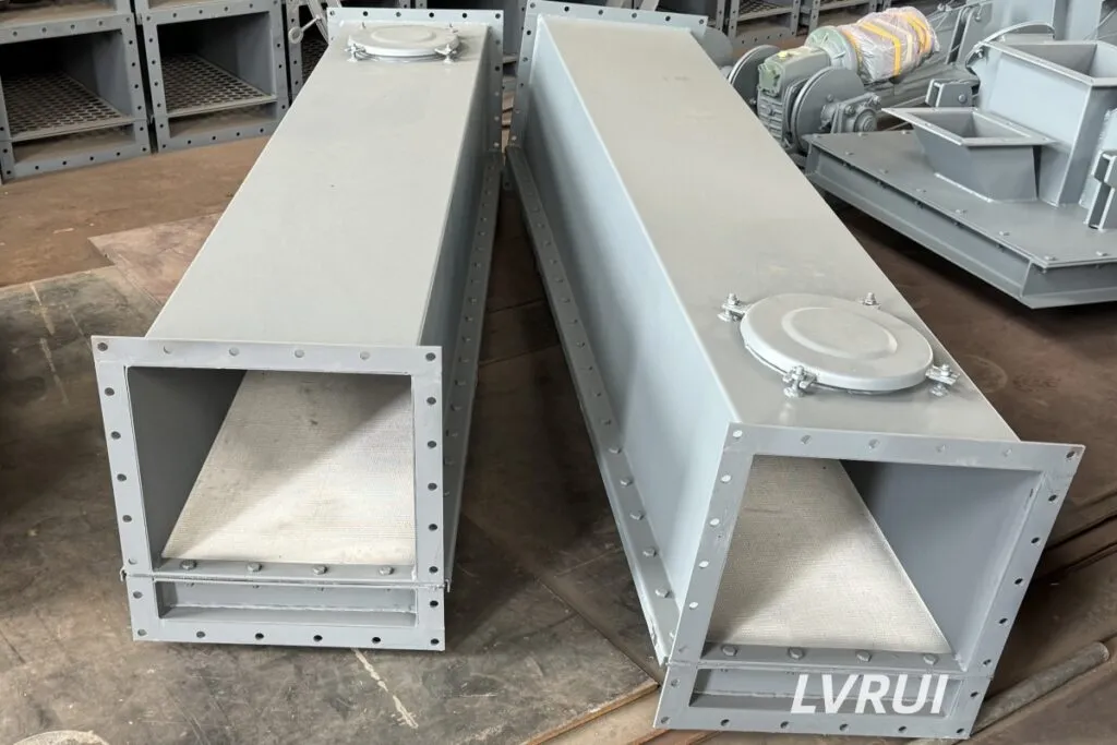 Air slide conveyor installation showing foundation alignment and slope positioning in a cement plant powder handling system